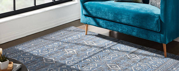 blue sofa & a beautiful carpet